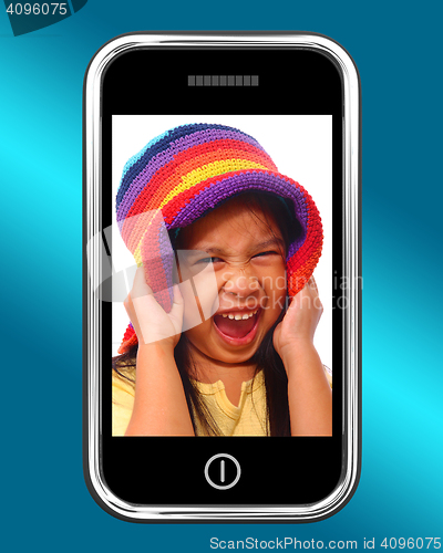 Image of Happy Laughing Young Girl Photo On Mobile Phone