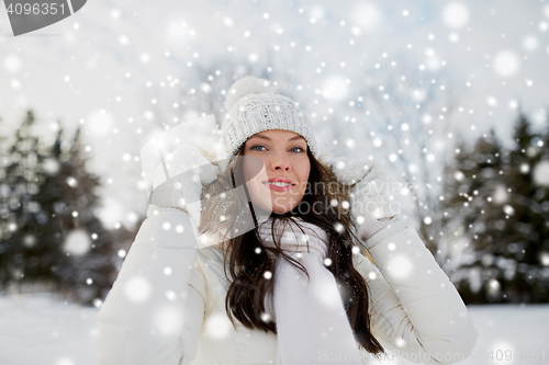 Image of happy woman outdoors in winter