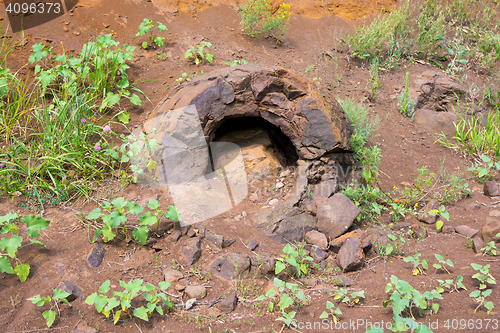 Image of Broken stone formation resembling a dinosaur egg with prodellanym hole found near the village of Wet Olhovka Kotovo District, Volgograd Region, Russia
