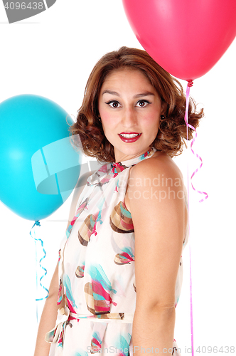 Image of Young woman with two balloons.