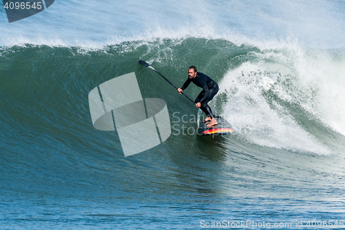 Image of Stand up paddle surfer