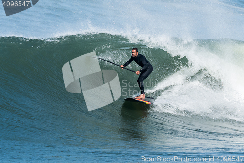 Image of Stand up paddle surfer