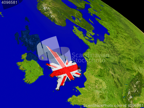 Image of United Kingdom with flag on Earth
