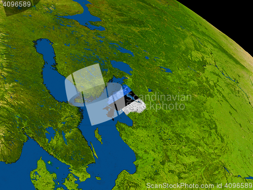 Image of Estonia with flag on Earth