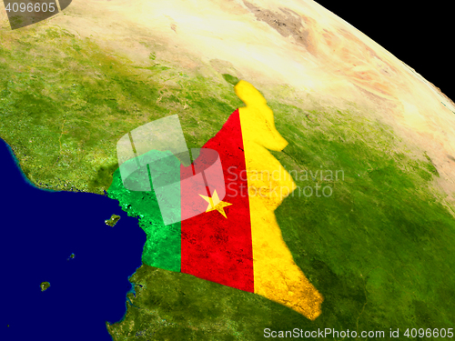 Image of Cameroon with flag on Earth