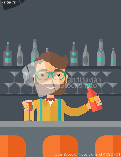 Image of Bartender at the bar holding a drinks.