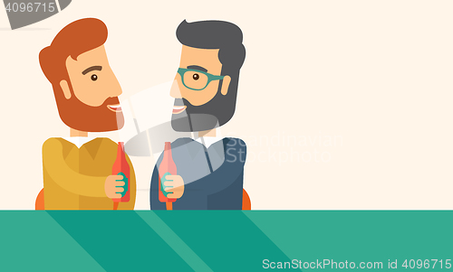 Image of Two co- workers having fun drinking beer in a pub.