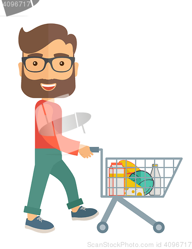 Image of Male Shopper Pushing a Shopping Cart.