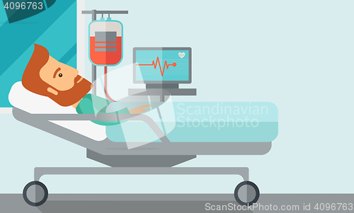 Image of Patient in hospital bed being monitored