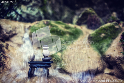 Image of Rock Zen Stack in front of waterfall.