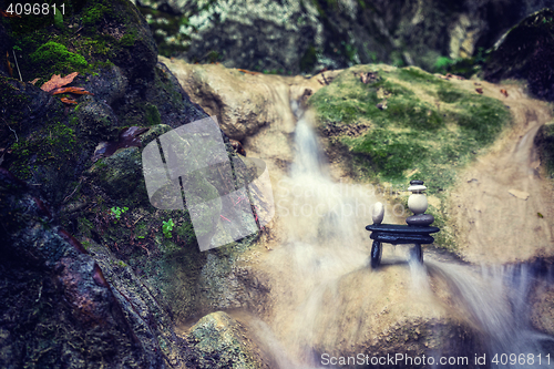 Image of Rock Zen Stack in front of waterfall.