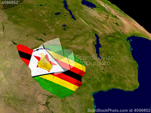 Image of Zimbabwe with flag on Earth