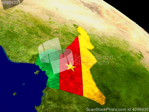 Image of Cameroon with flag on Earth