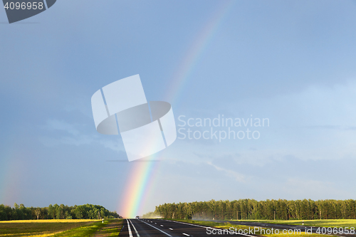 Image of rainbow on the road