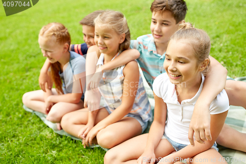 Image of group of happy kids or friends outdoors