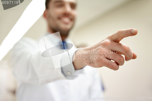 Image of close up of doctor pointing finger at hospital