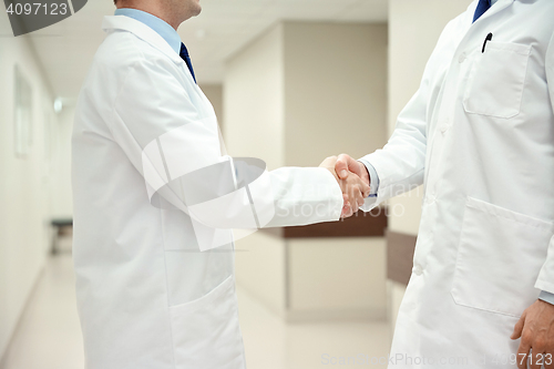 Image of close up of doctors making handshake