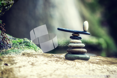 Image of Rock Zen Stack in front of waterfall.