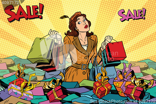 Image of Woman with shopping in a sea of sales