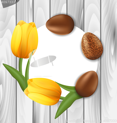 Image of Greeting Card with Easter Chocolate Eggs and Yellow Tulips Flowe