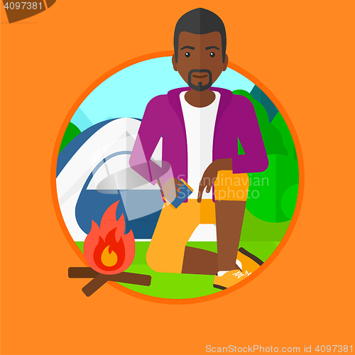 Image of Man kindling campfire vector illustration.
