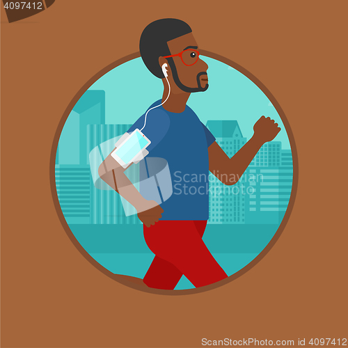 Image of Man running with earphones and smartphone.