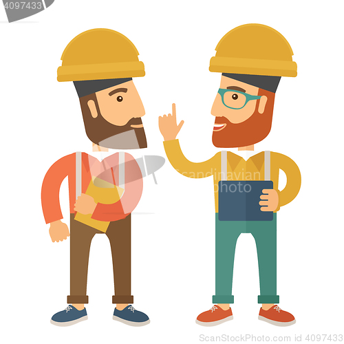 Image of Two workers talking.