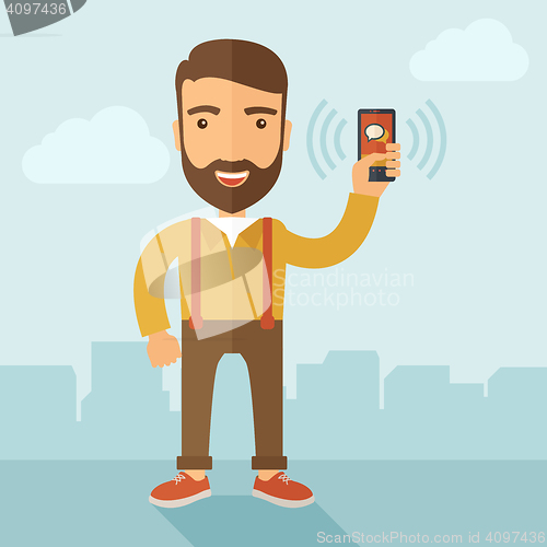 Image of Man holding smartphone.