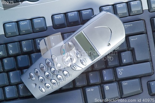 Image of Cordless Phone on Keyboard