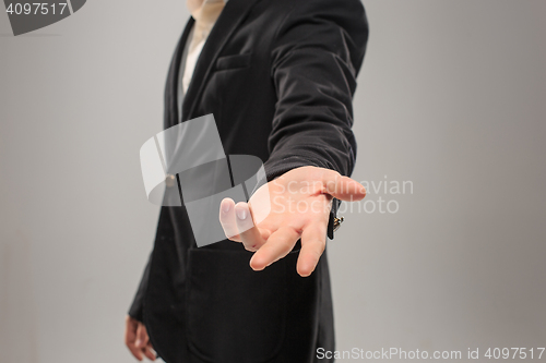 Image of Dressed in a business suit caucasian male hand