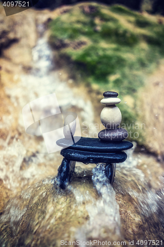 Image of Rock Zen Stack in front of waterfall.