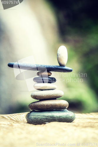 Image of Rock Zen Stack in front of waterfall.