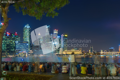 Image of  Marina Bay Sands at night during Light and Water Show \'Wonder F