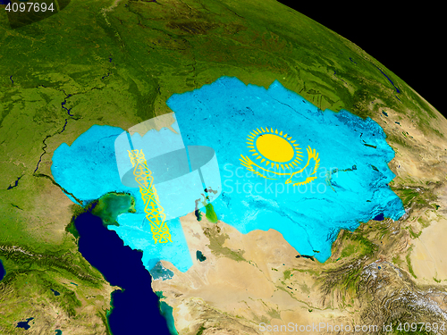 Image of Kazakhstan with flag on Earth