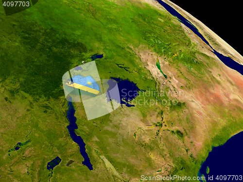 Image of Rwanda with flag on Earth