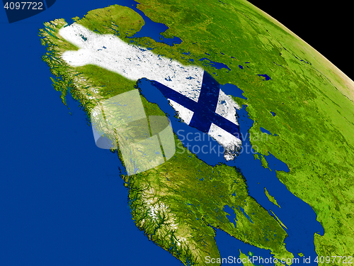 Image of Finland with flag on Earth
