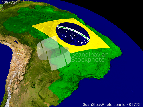Image of Brazil with flag on Earth