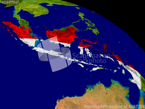 Image of Indonesia with flag on Earth