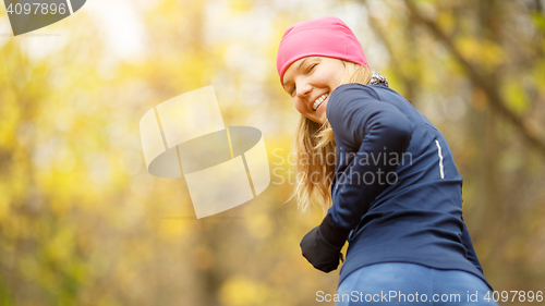 Image of Smiling girl on morning jog