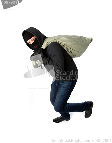 Image of Thief running away with bag