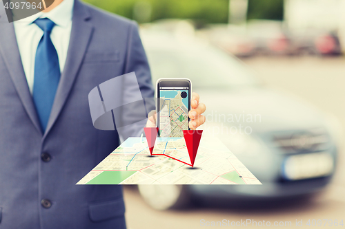 Image of close up of business man with smartphone navigator