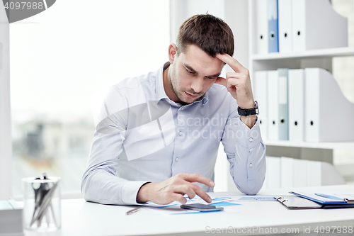 Image of close up of businessman with smartphone