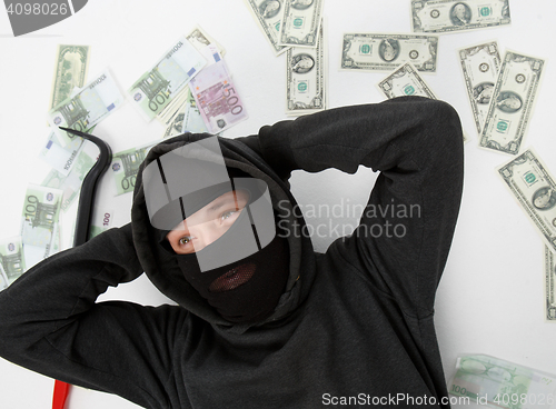 Image of Robber lying on white floor