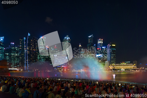 Image of  Marina Bay Sands at night during Light and Water Show \'Wonder F