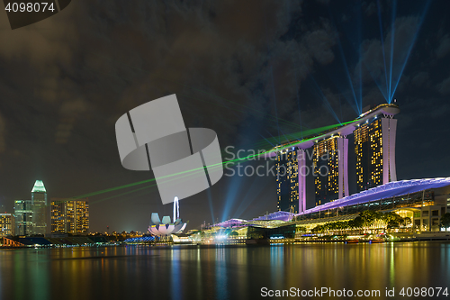 Image of  Marina Bay Sands at night during Light and Water Show \'Wonder F