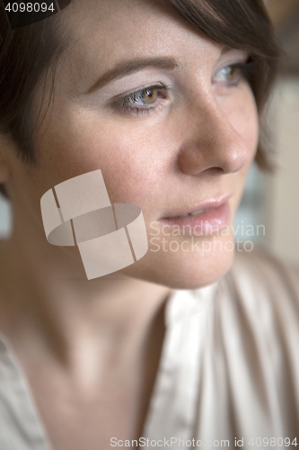 Image of Indoor portrait of natural woman