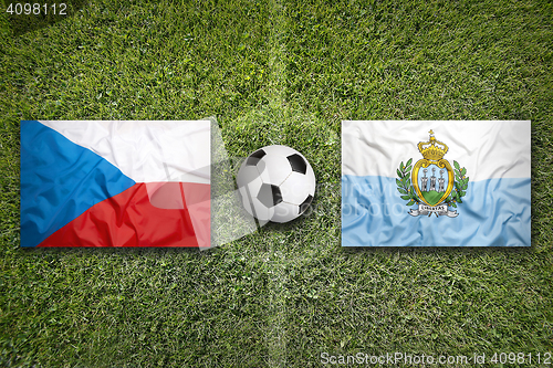 Image of Czech Republic vs. San Marino flags on soccer field