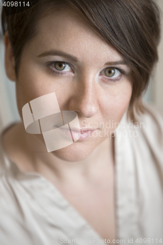 Image of Indoor portrait of natural woman