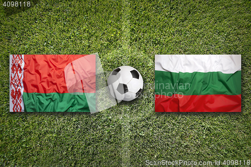 Image of Belarus vs. Bulgaria flags on soccer field