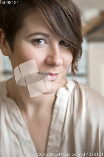 Image of Indoor portrait of natural woman